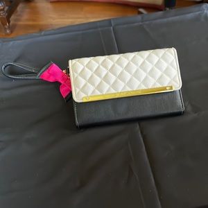 BETSY JOHNSON WRISTLET; black and white; gold inside